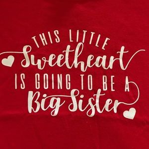 This little sweetheart is going to be a big sister